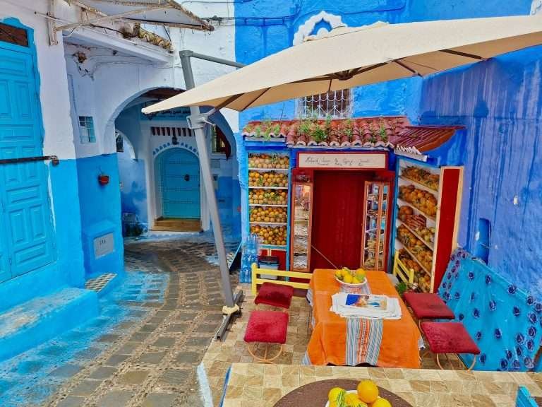 Juice and coffee cafe on an alleyway in the blue streets of Chefchaouen, Morocco