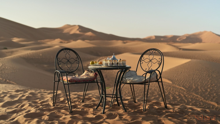Afternoon tea and Moroccan pastries in the middle of the Sahara dunes