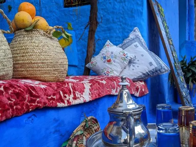 Moroccan mint tea served on a colourful table in Chefchaouen