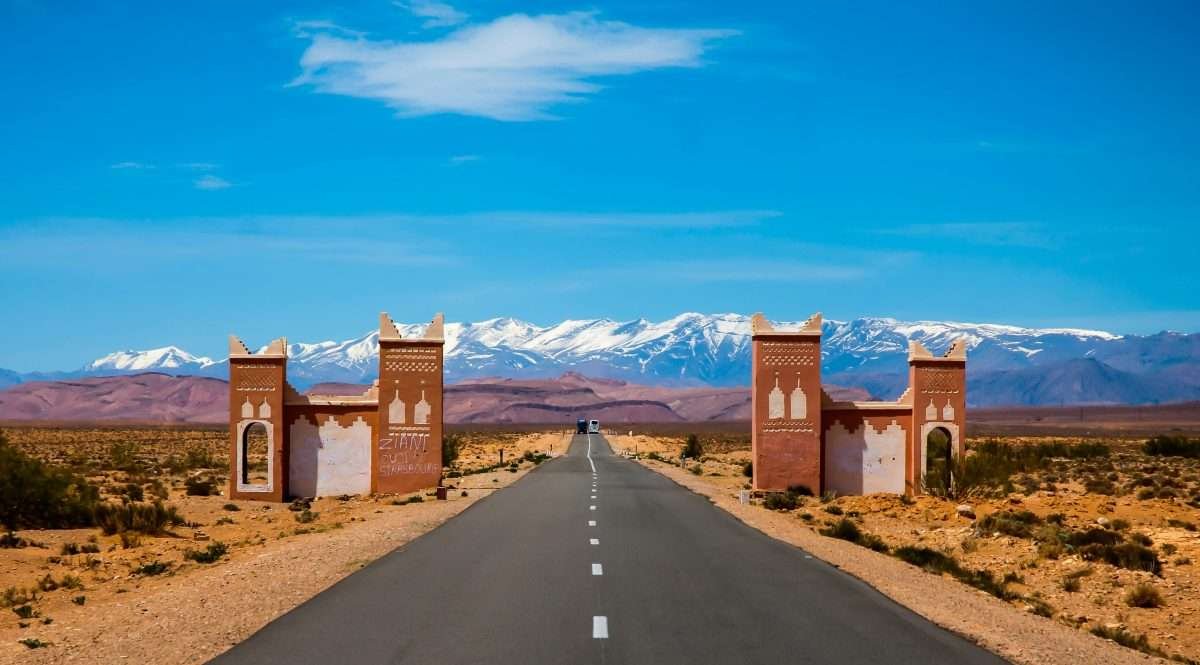 Road to the Atlas Mountains with desert kasbah scenery in Morocco