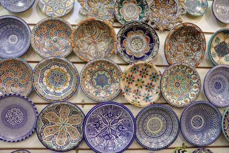 Hand-painted Moroccan ceramic plates on display in Fes